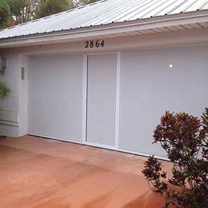 image of home with garage door screen