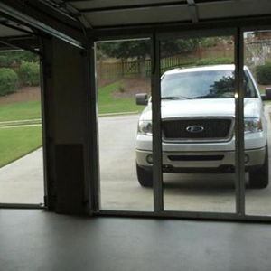 image of home with garage door screen