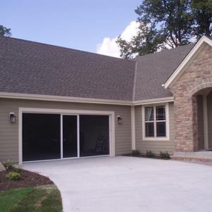 image of home with garage door screen