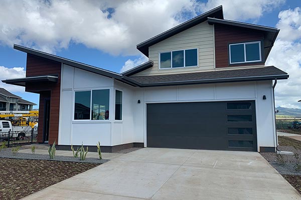 image of brand new steel garage door for residence by Raynor Hawaii